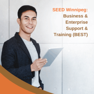 Asian man smiling holding an ipad